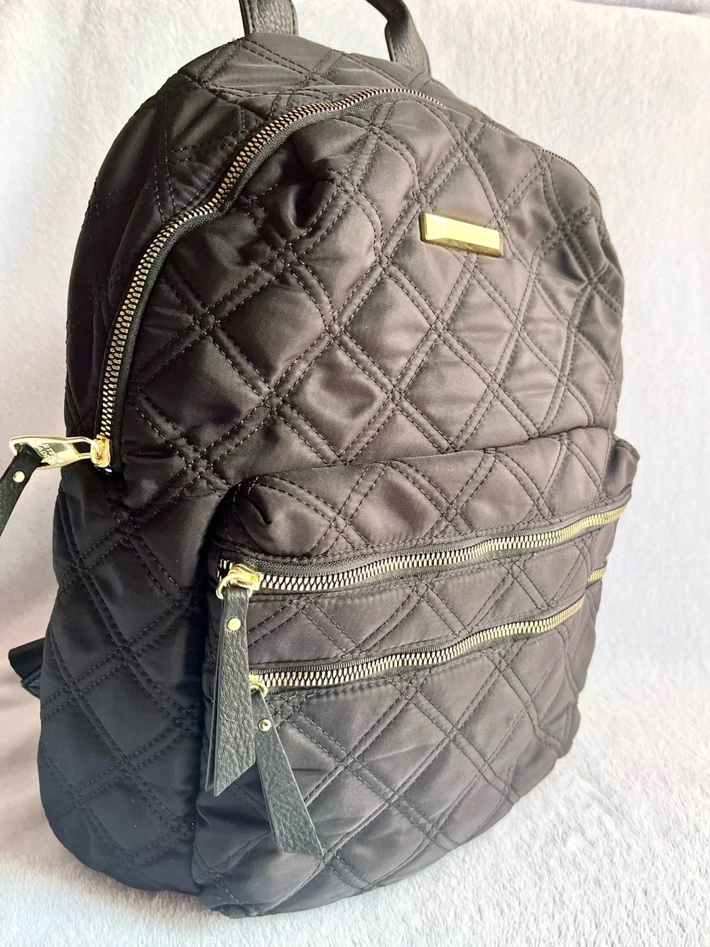 Steve Madden Quilted Black Backpack with Gold Accents